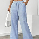 Alina™ | Elegantes pantalones a rayas con bolsillos