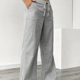 Alina™ | Elegantes pantalones a rayas con bolsillos