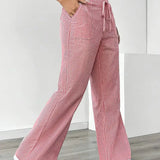 Alina™ | Elegantes pantalones a rayas con bolsillos