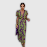 Vera | Vestido midi cruzado floral con mangas abullonadas