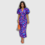Vera | Vestido midi cruzado floral con mangas abullonadas