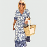 Constance | Vestido midi con estampado floral en el borde y bajo escalonado