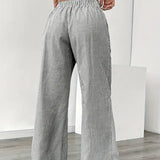 Alina™ | Elegantes pantalones a rayas con bolsillos