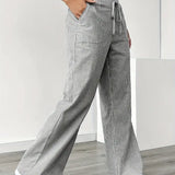 Alina™ | Elegantes pantalones a rayas con bolsillos