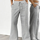 Alina™ | Elegantes pantalones a rayas con bolsillos