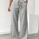 Alina™ | Elegantes pantalones a rayas con bolsillos
