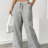 Alina™ | Elegantes pantalones a rayas con bolsillos