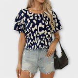 Evelyn – Blusa casual con cuello redondo