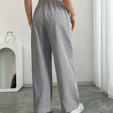 Alina™ | Elegantes pantalones a rayas con bolsillos