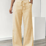 Alina™ | Elegantes pantalones a rayas con bolsillos