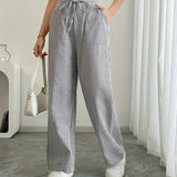 Alina™ | Elegantes pantalones a rayas con bolsillos