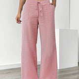 Alina™ | Elegantes pantalones a rayas con bolsillos